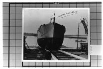 Exterior View-  Bow of unknown ship, being loaded onto a dry dock.  